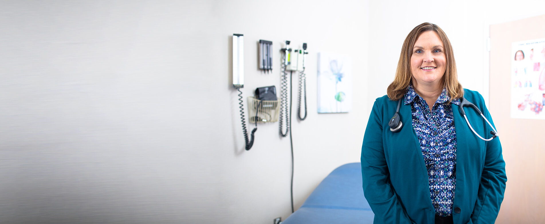 doctor standing in a doctors office